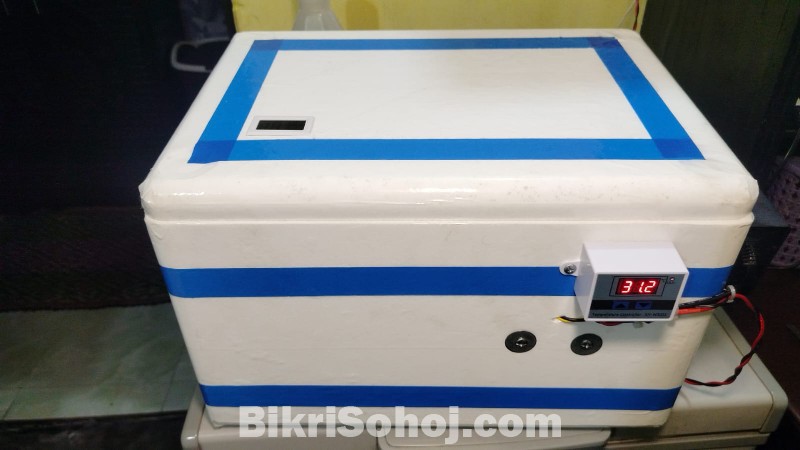 Egg incubator machine
