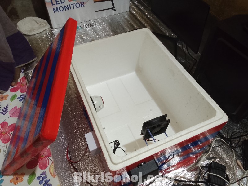 Egg incubator machine