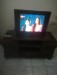 Flat CRT TV with wooden stand