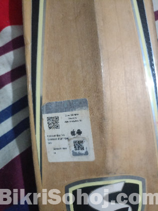 SG cricket bat.