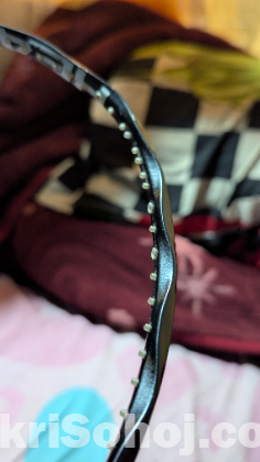 Raket ব্যাডমিন্টন রেকেট।