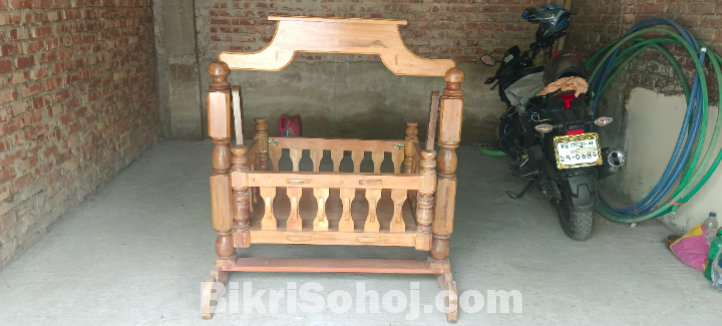 বাচ্চাদের দোলনা