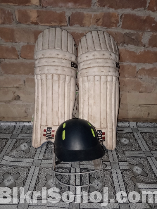 cricket bat, helmet, pad._ ক্রিকেট ব্যাট,হেলমেট, প্যাড